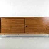 Teak sideboard with glass legs, France - 1990s