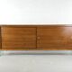 Teak sideboard with glass legs, France - 1990s