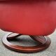 Red leather relax armchair and pouf