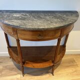 Half-moon console in mahogany with a marble top in Louis XVI style.