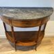 Half-moon console in mahogany with a marble top in Louis XVI style.
