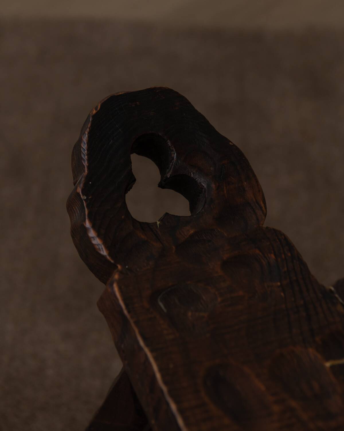 Spanish brutalist tripod chair in carved solid wood