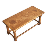 Brutalist coffee table in solid oak, metal, and patinated leather, 1940s.
