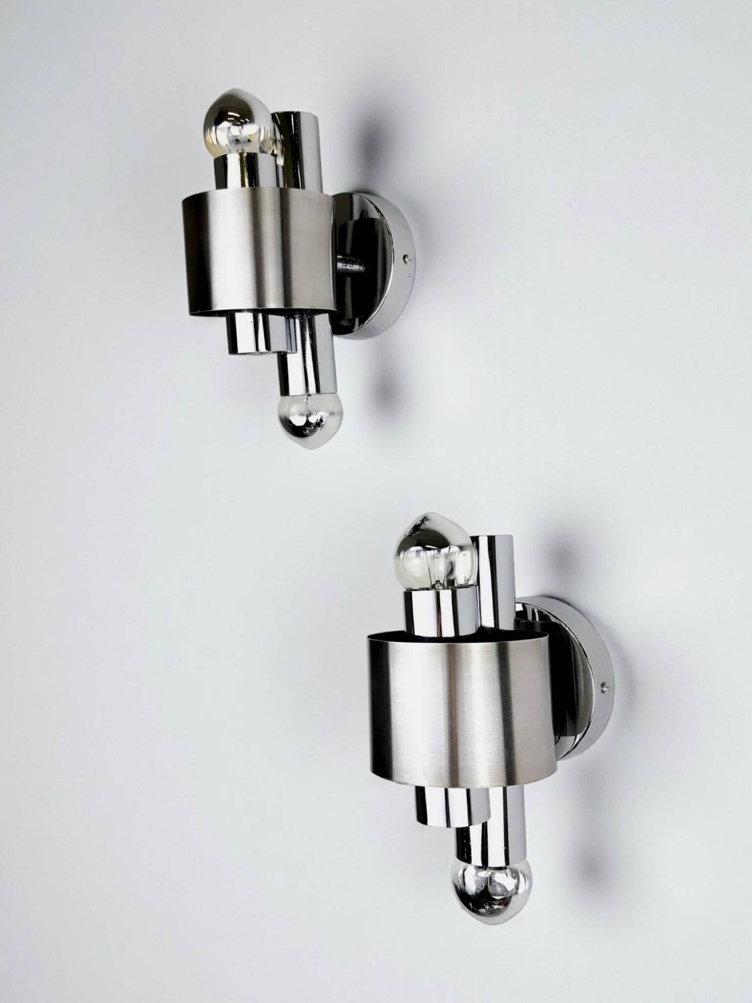 Pair of space age 2-light wall sconces, chromed metal, Italy, 1970s