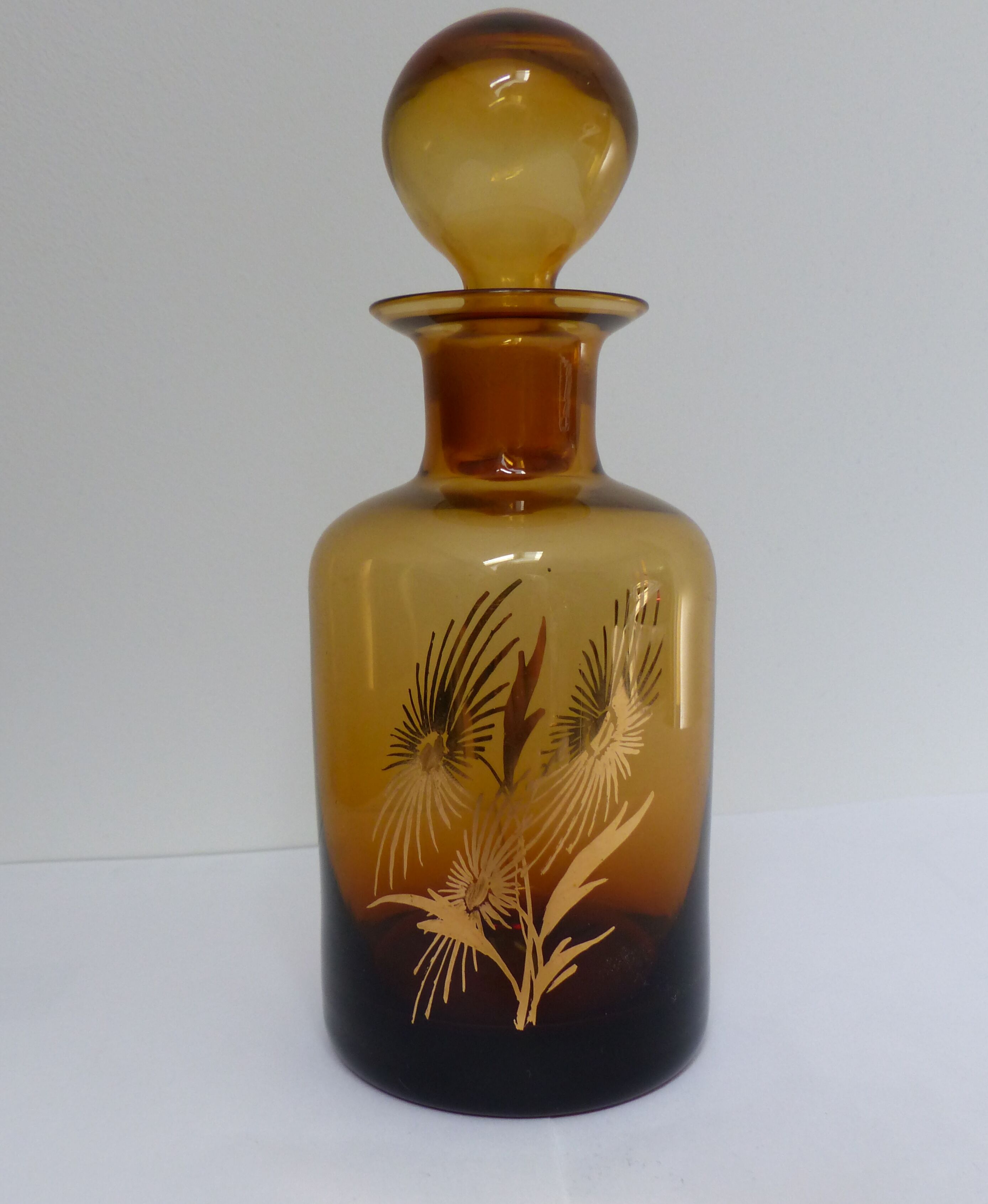 Decorated and signed perfume bottle, brown glass, painted "by hand Clary Paris"