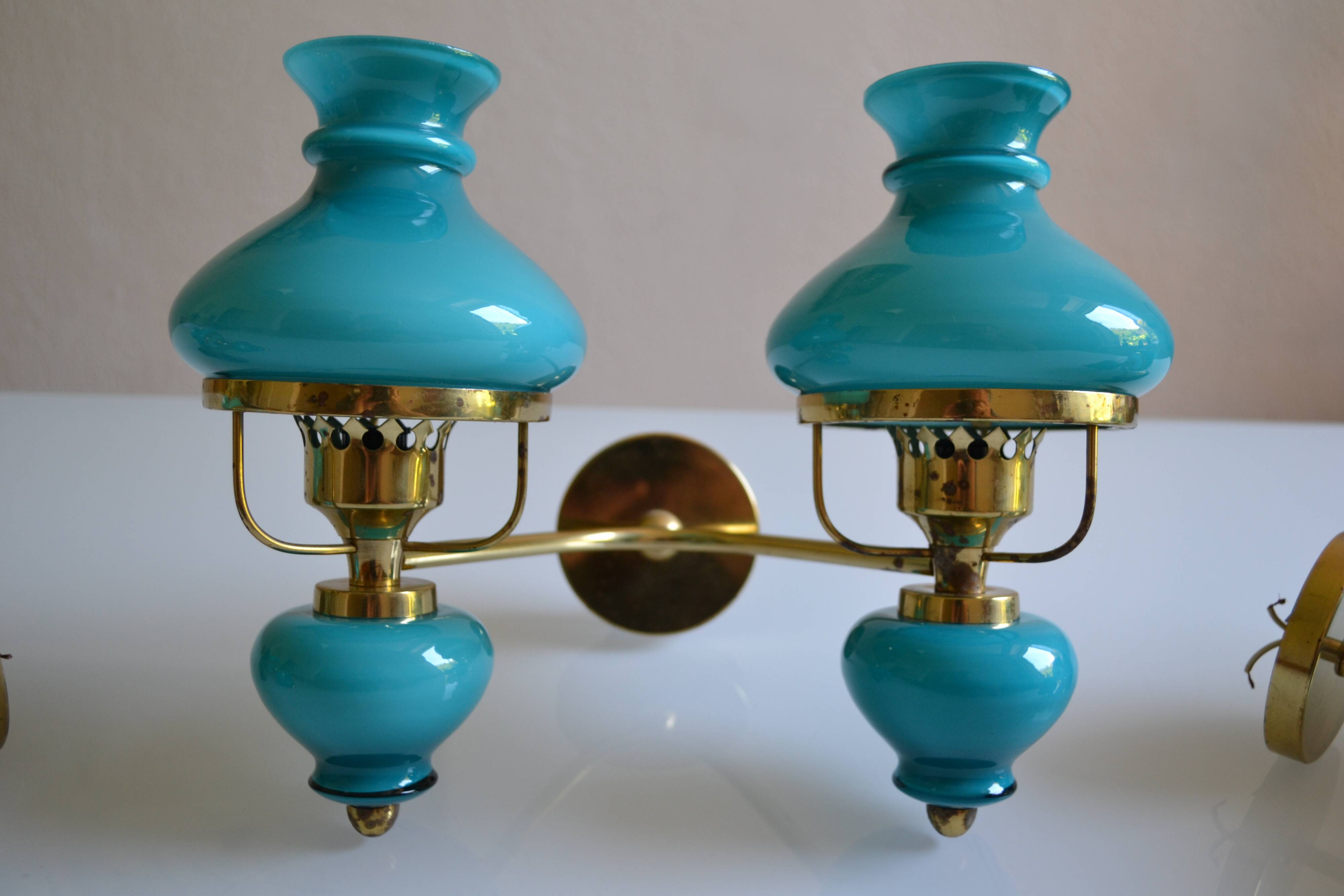 Series of 3 vintage brass and blue opaline wall lamps