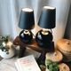 Duo de lampes en opaline noire art déco
