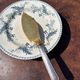 Silver-handled pie server Minerve, golden blade, Louis style.