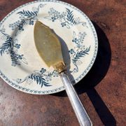 Silver-handled pie server Minerve, golden blade, Louis style.