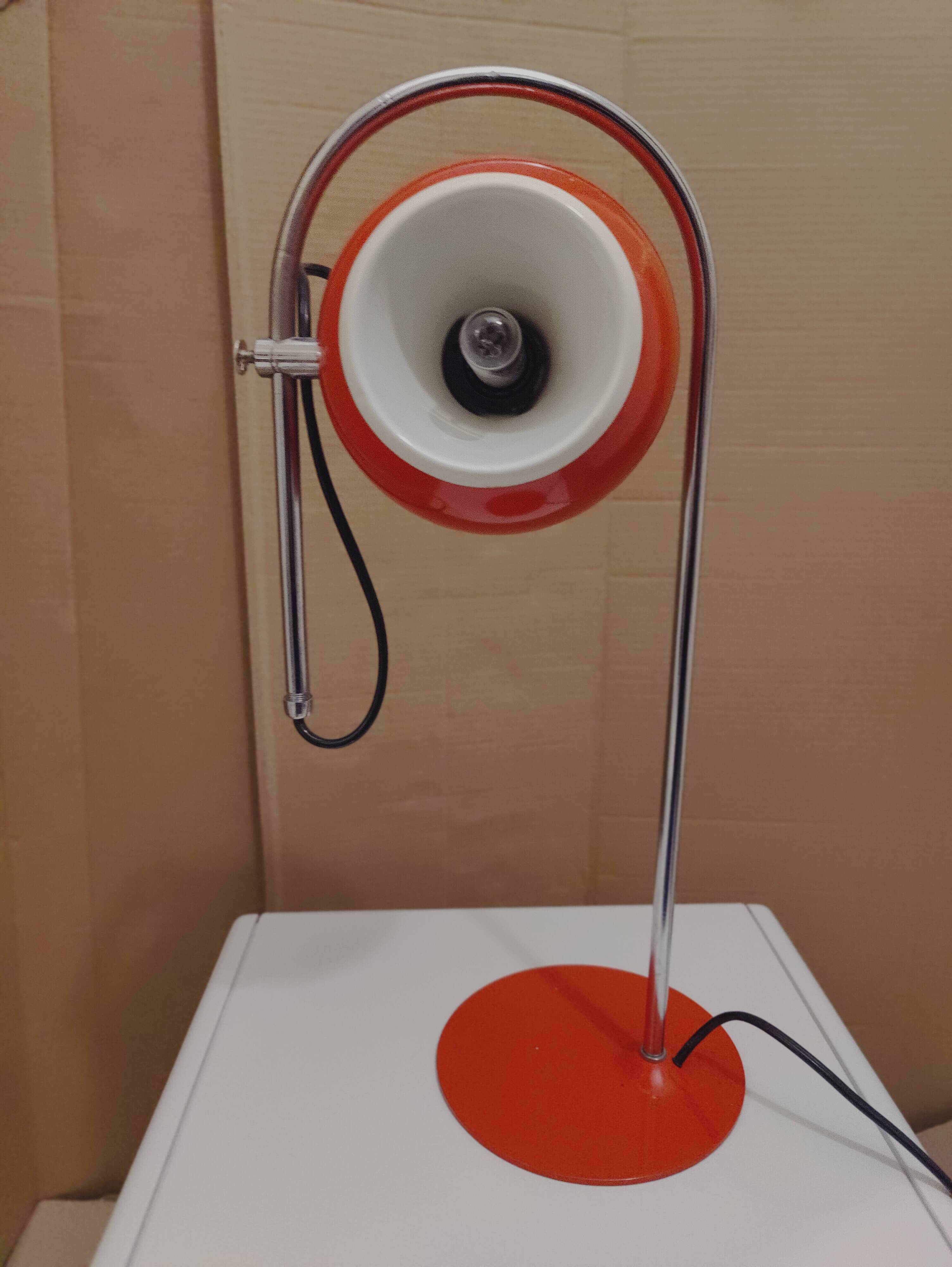 Eyeball space age orange desk or bedside lamp on an arc base