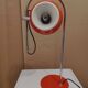Eyeball space age orange desk or bedside lamp on an arc base