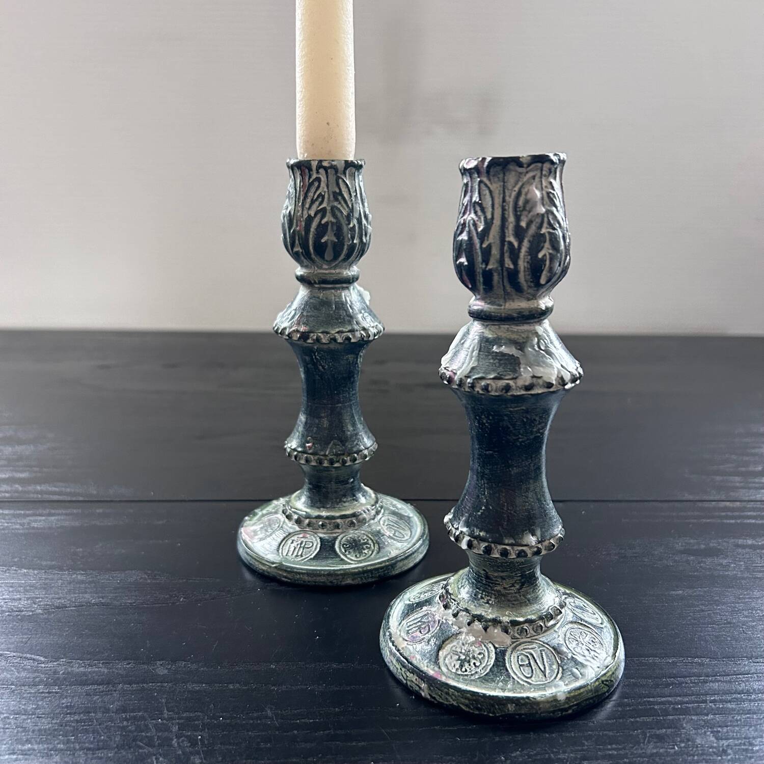 Pair of green ceramic candlesticks