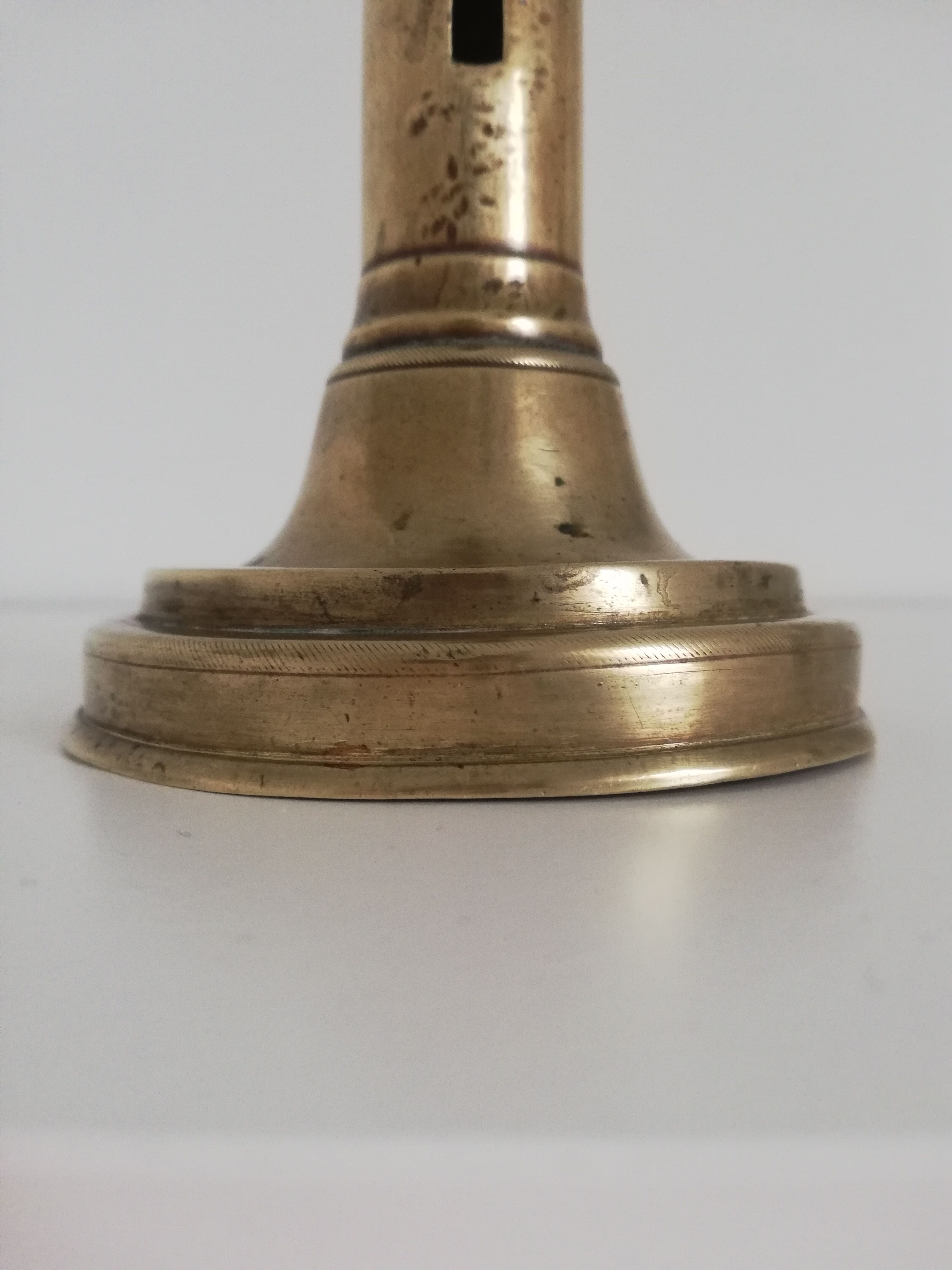 Vintage push candle holder