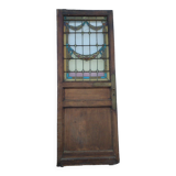 porte en chêne avec des vitraux
