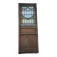 porte en chêne avec des vitraux