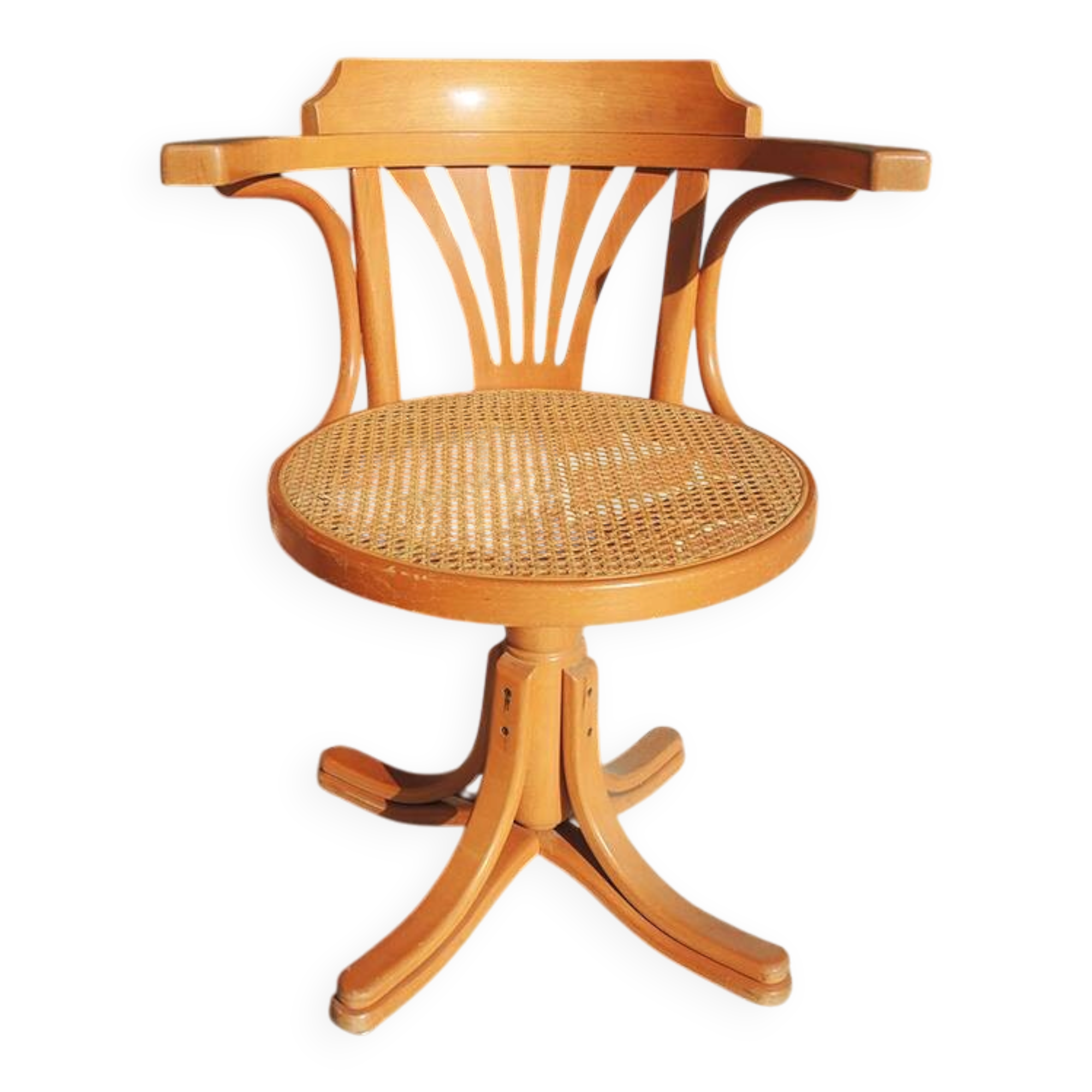 Vintage American swivel chair in wood and cane.
