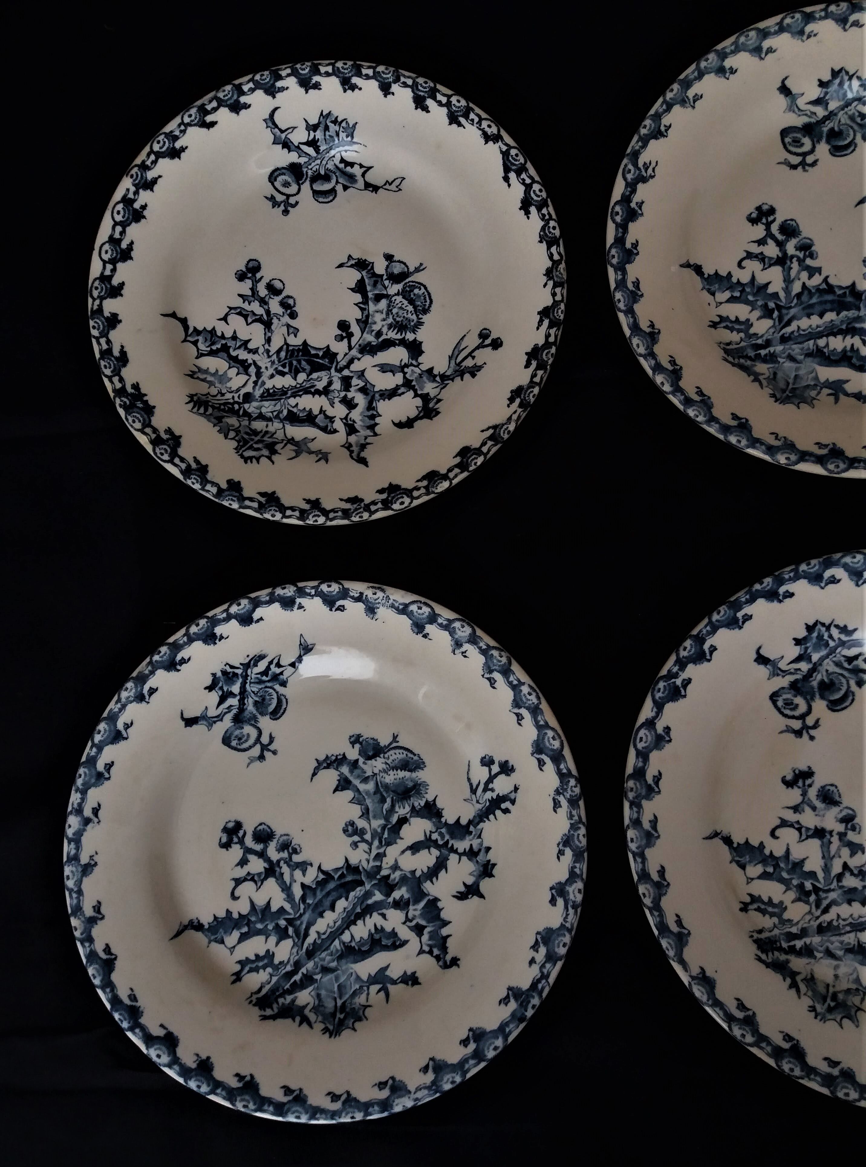 Lot of six flat plates in earthenware Gien décor blue thistles