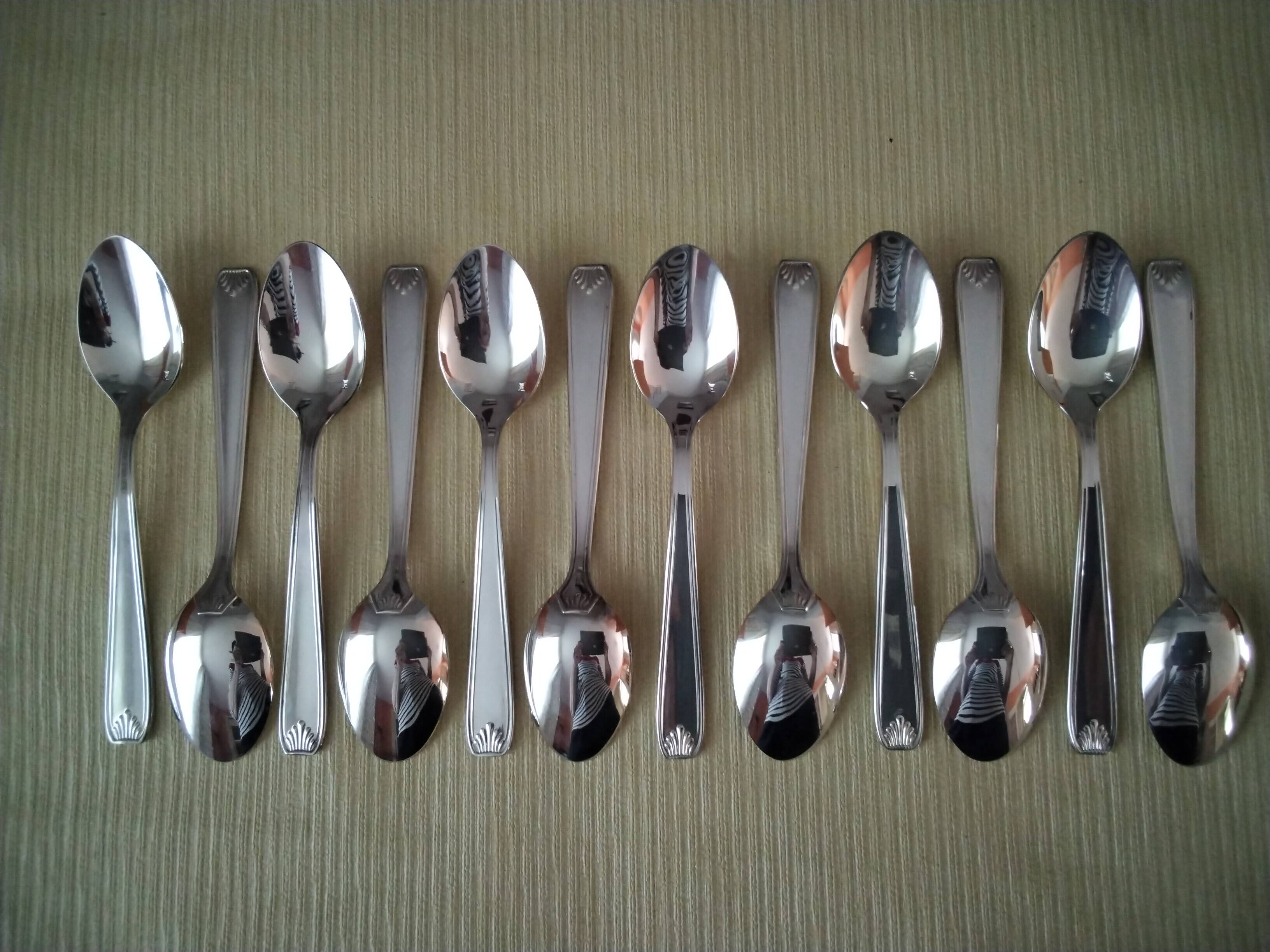 Set of 12 silver-plated coffee spoons in "shell" design.