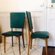 Two 1950s chairs made of wood and skai
