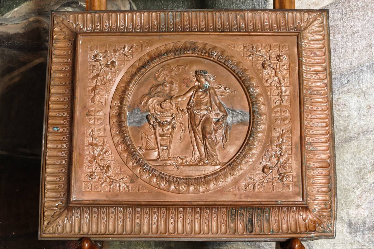 Repoussé copper plaque, early 19th century, in Neoclassical style.