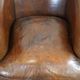 Set of two rugged sheep let of two rugged sheep leather club armchairs with a nice distressed look
