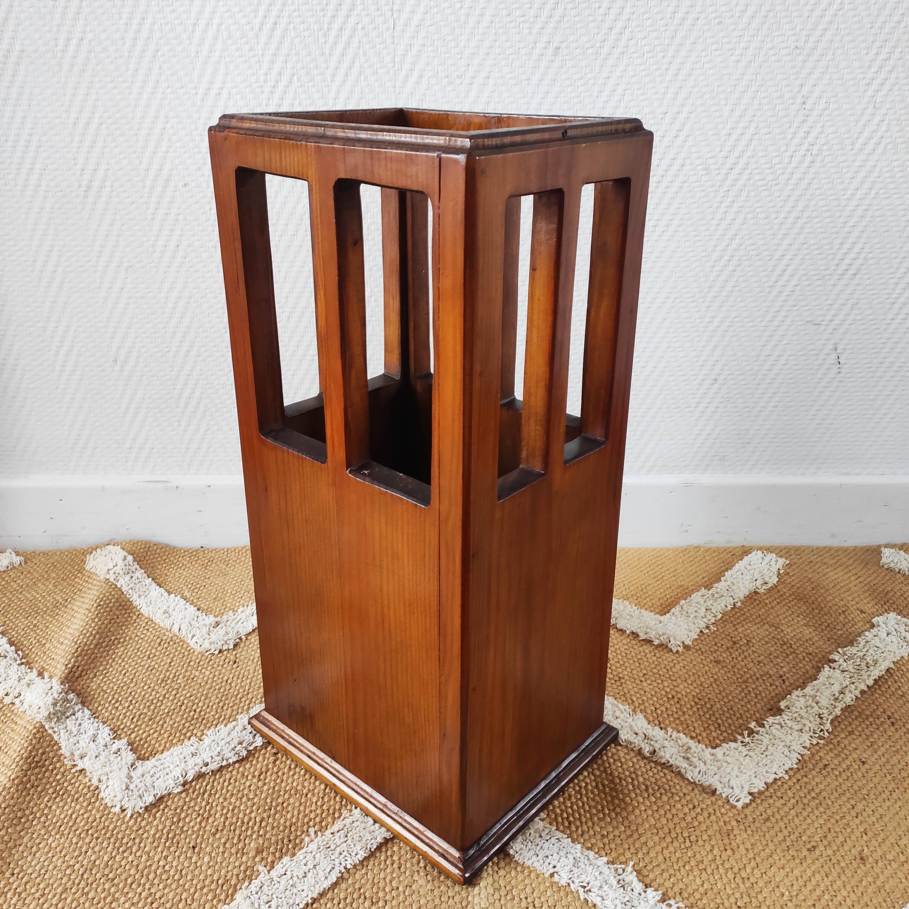 Vintage brutalist umbrella stand made of solid wood.