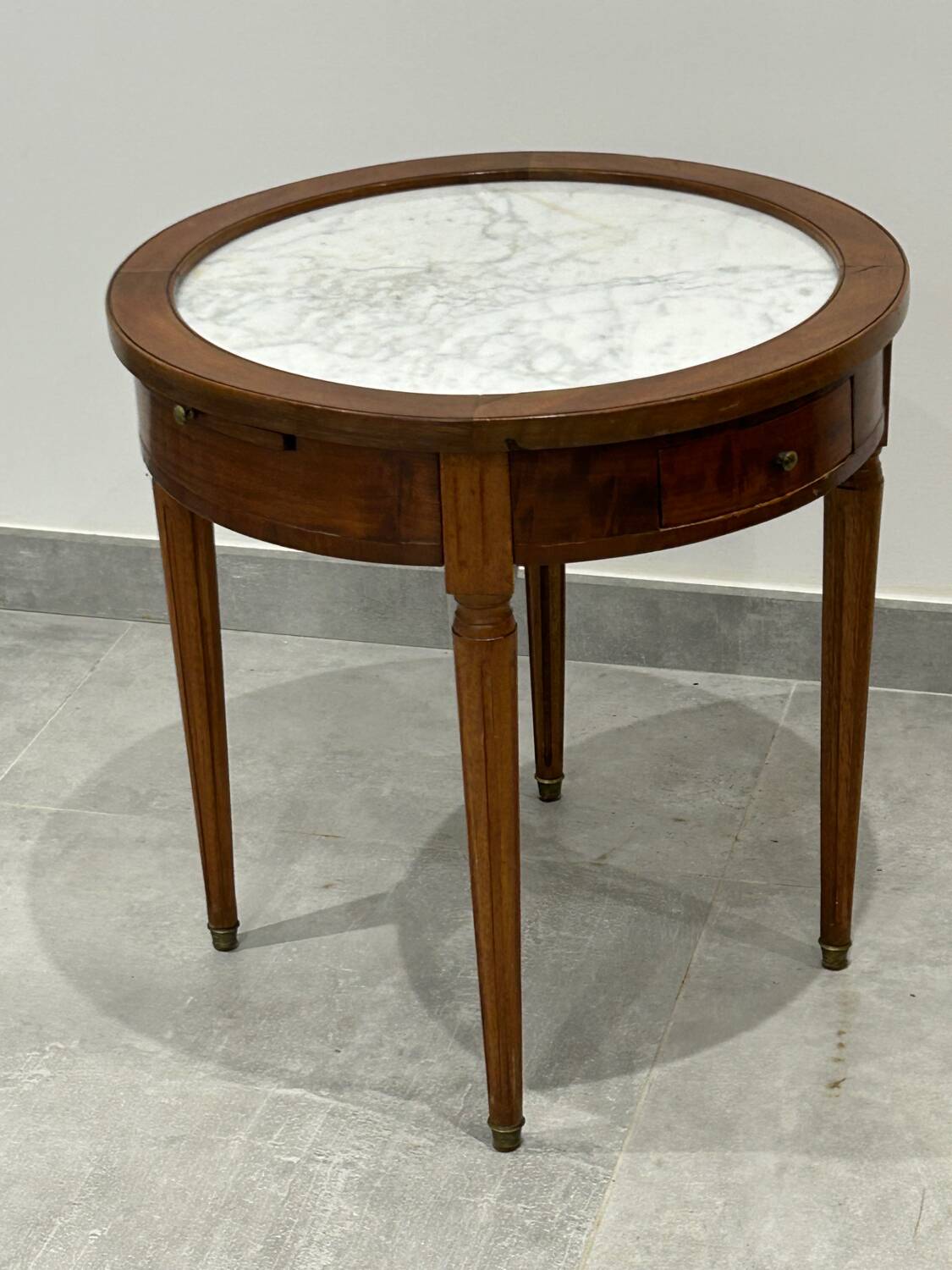 Low bouillotte side table with a pull and drawers.