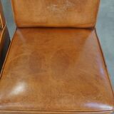 Set of 4 sheepskin dining chairs in light cognac color