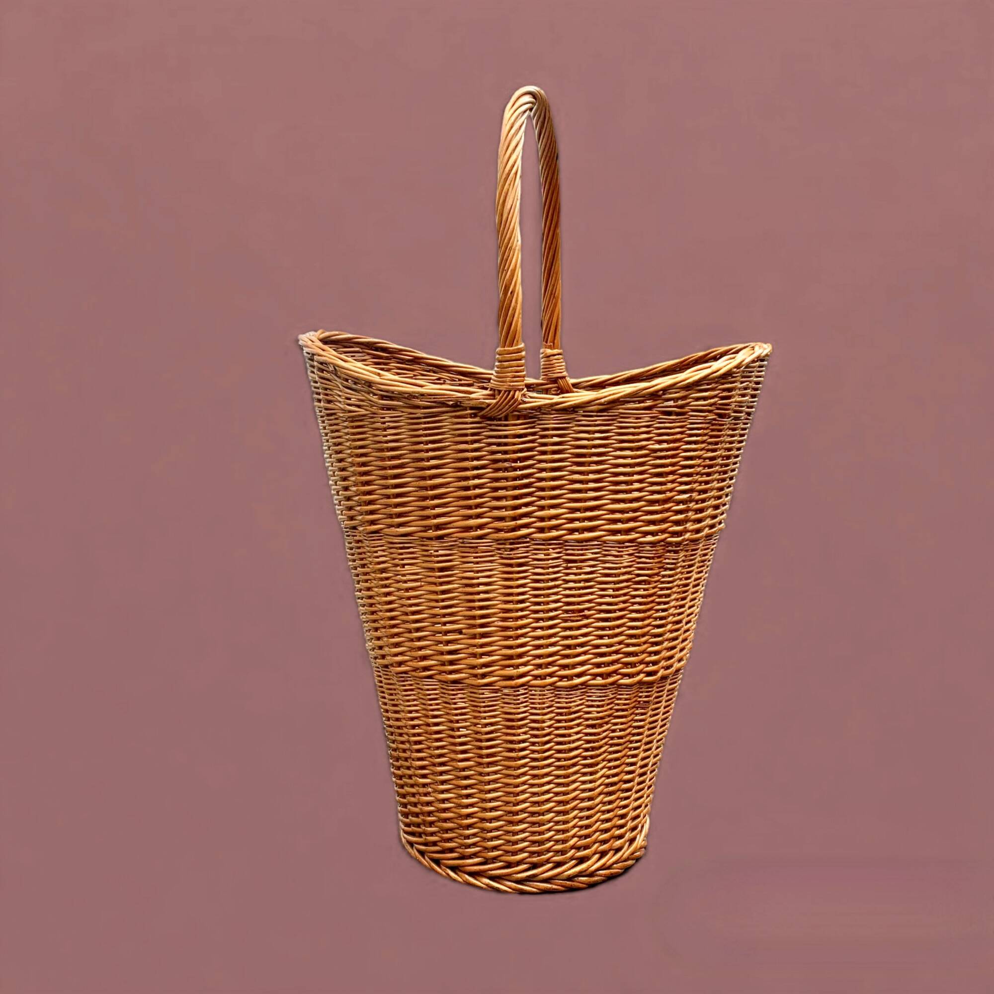 Old woven wicker umbrella stand