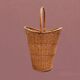 Old woven wicker umbrella stand