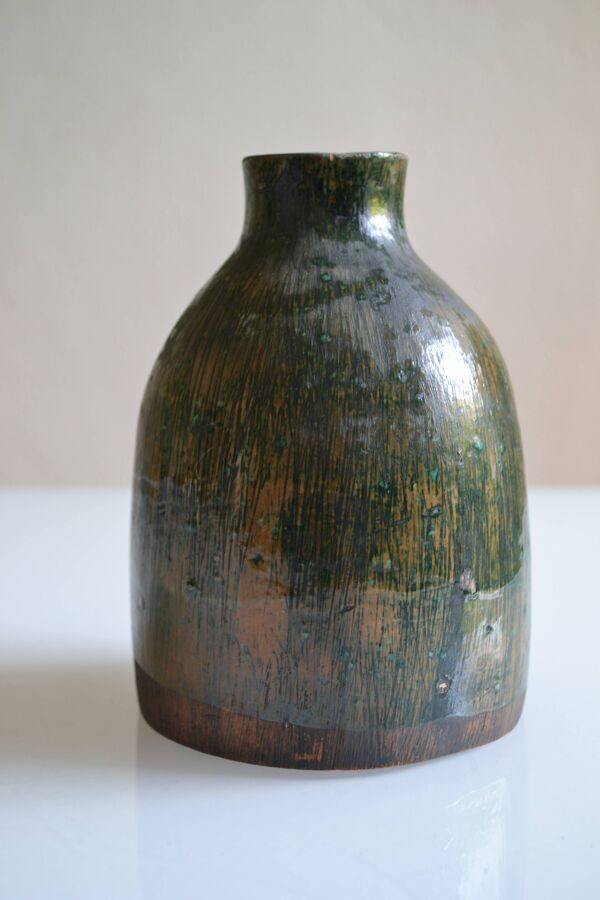 Vase en céramique signature au poisson à identifier