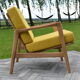 Scandinavian armchair, yellow fabric, natural wood
