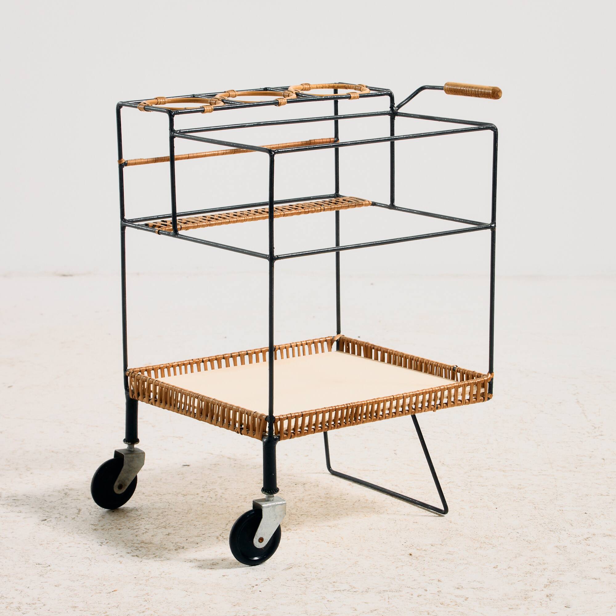 Metal cart with bamboo and wicker details.