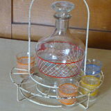 Service a Liqueur consisting of a metal servant, a carafe and 6 small vintage glasses 1950