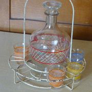 Service a Liqueur consisting of a metal servant, a carafe and 6 small vintage glasses 1950