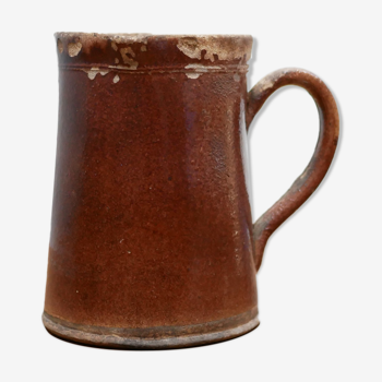 Vintage pitcher in glazed terracotta