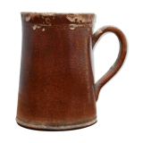 Vintage pitcher in glazed terracotta