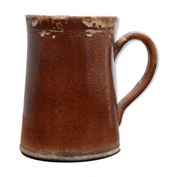 Vintage pitcher in glazed terracotta