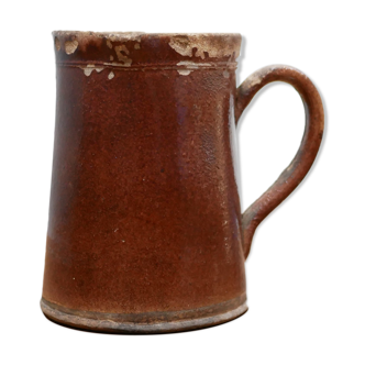 Vintage pitcher in glazed terracotta