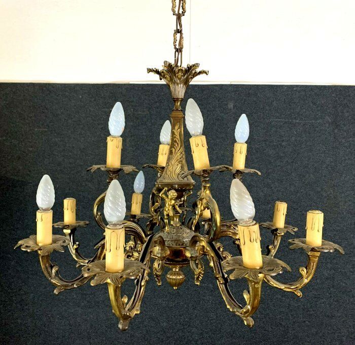 Napoleon III style chandelier in gilded bronze and patinated with putti decorations