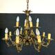 Napoleon III style chandelier in gilded bronze and patinated with putti decorations