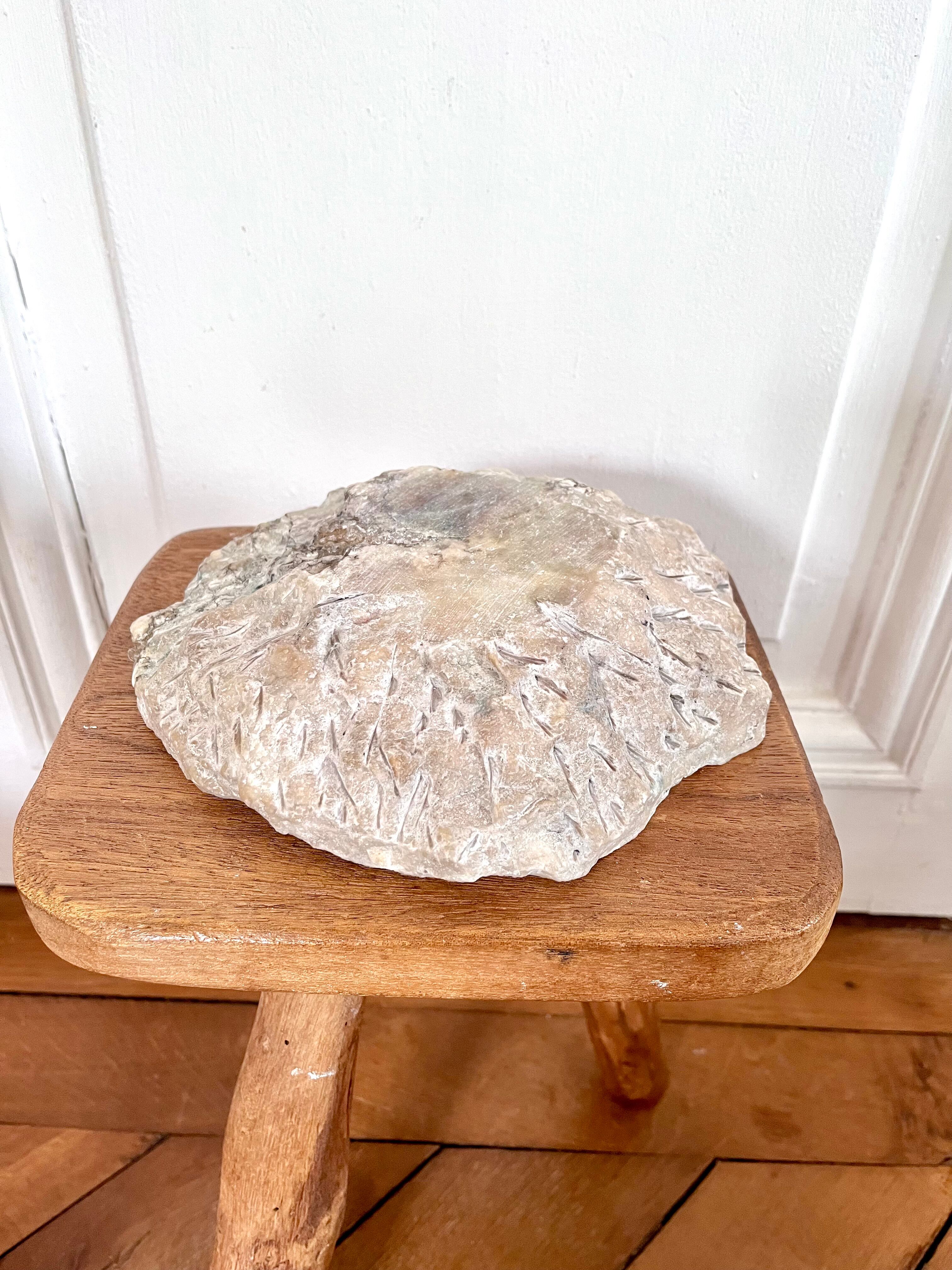Large ashtray dish made of marbled alabaster.
