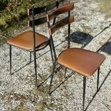Pair of metal and imitation leather chairs 1950