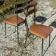 Pair of metal and imitation leather chairs 1950