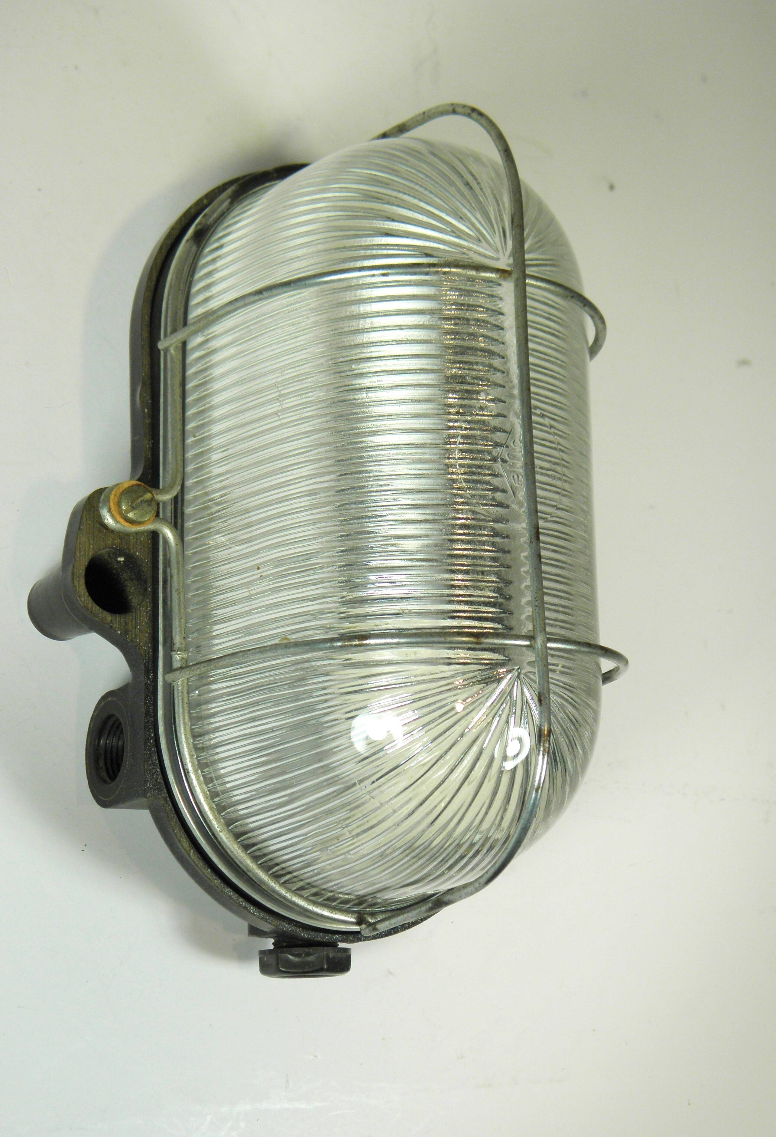 Glass and Bakelite wall light from the 1950s.