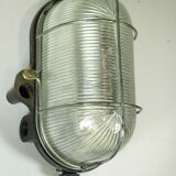 Glass and Bakelite wall light from the 1950s.