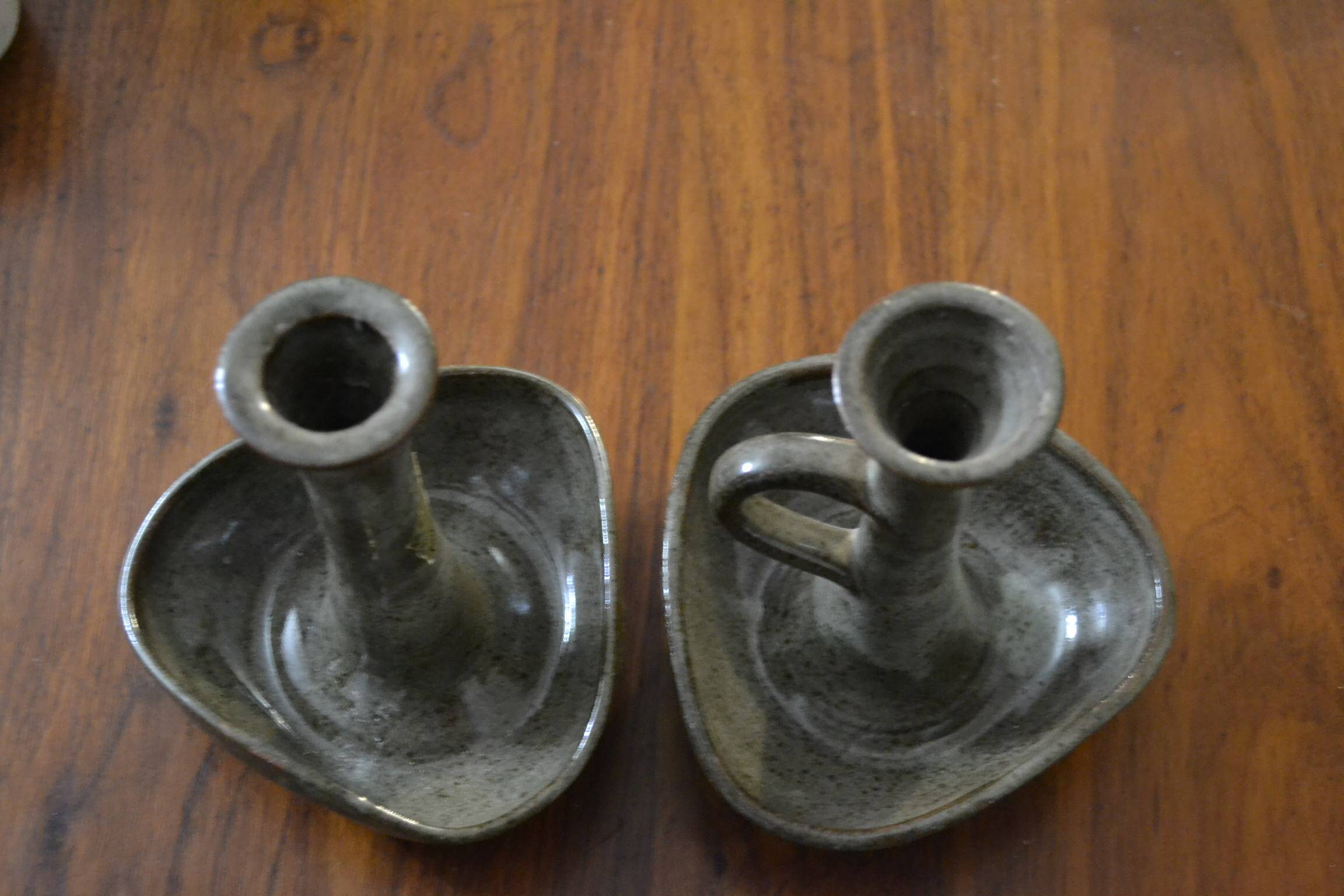 Set of 2 stoneware Cyclops candlesticks