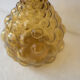 Green yellow bubble glass bottle