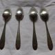 10 small silver spoons