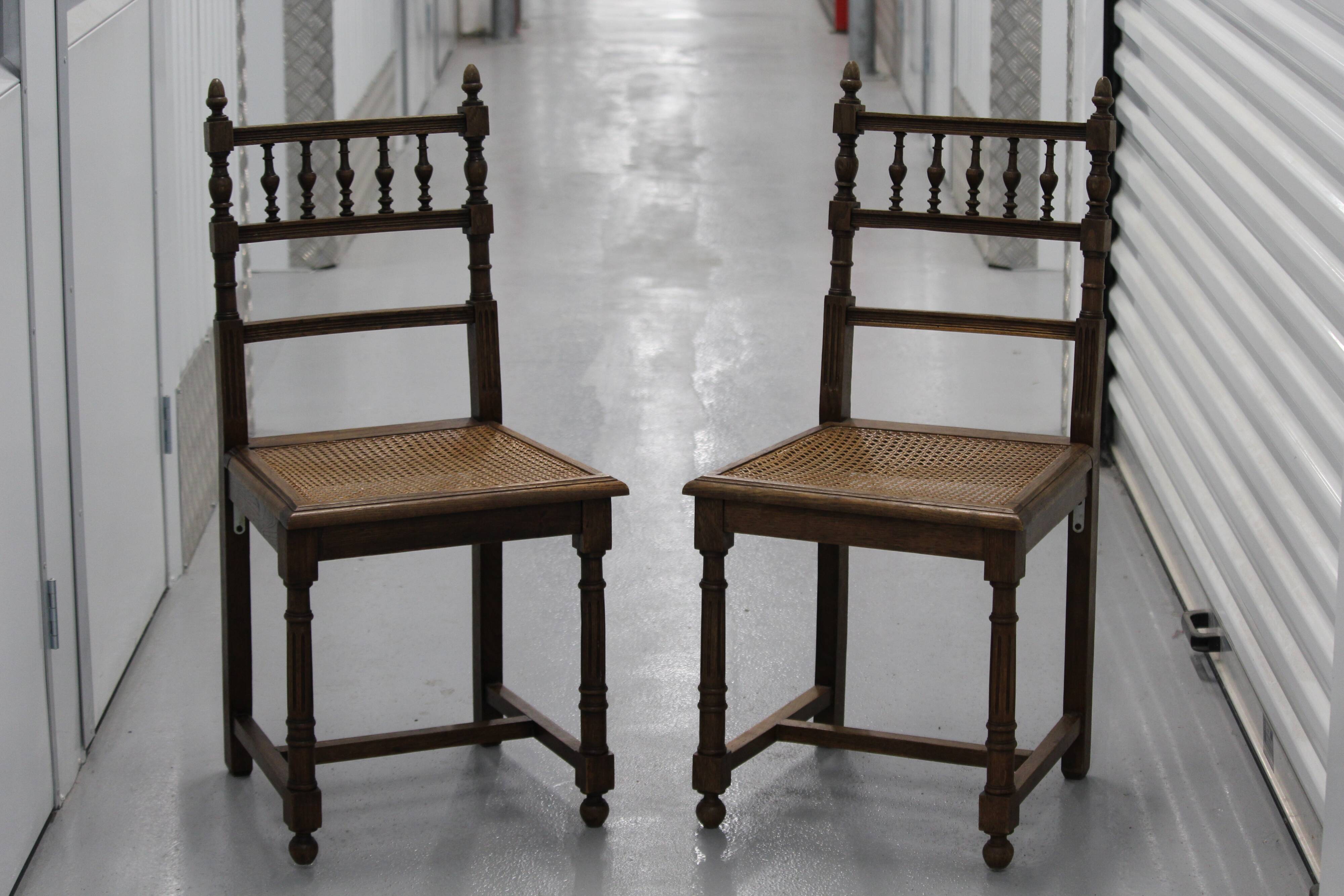 Pair of wooden caned chairs